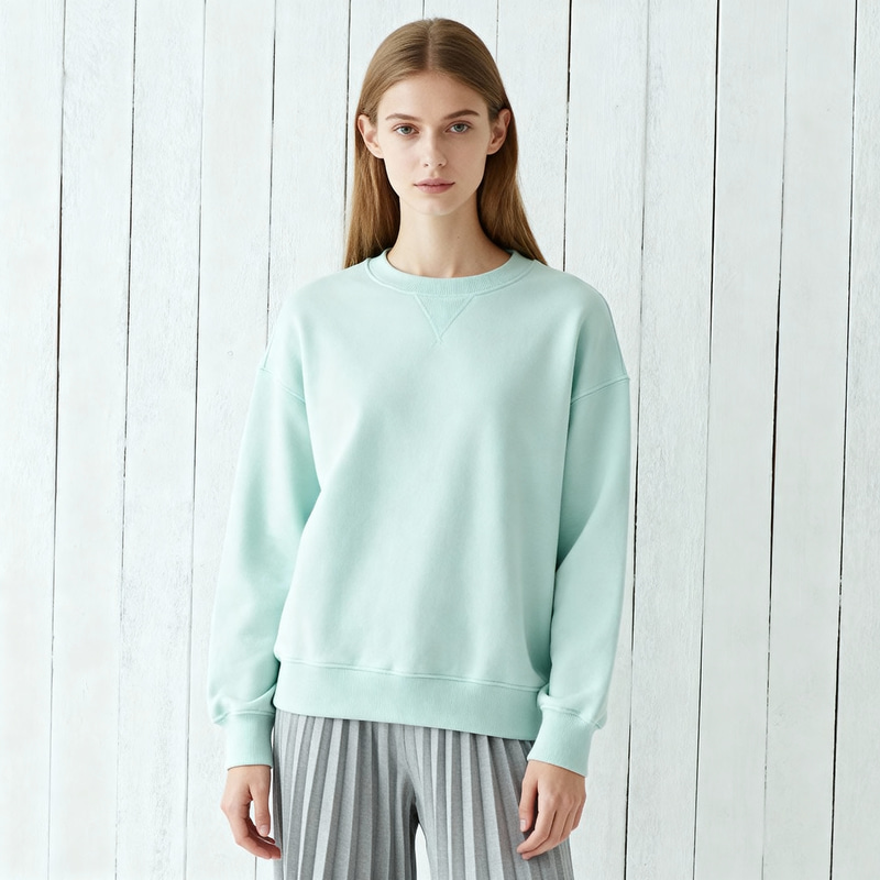Chic Slim Woman in Mint Sweatshirt with Scandinavian Style Chic Slim Woman in Mint Sweatshirt with Scandinavian Style