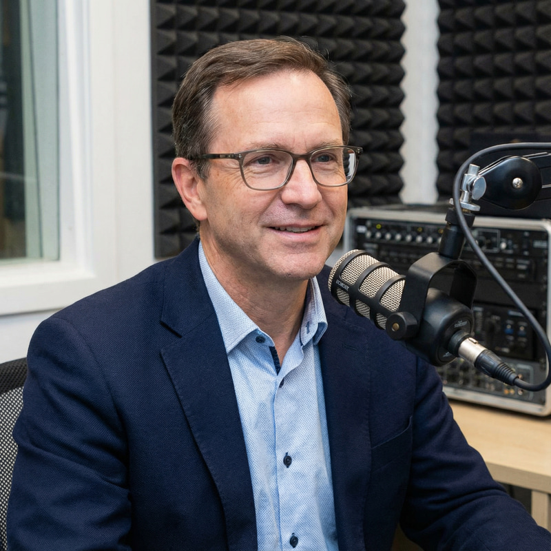 Professional Podcast Host Portrait in a Recording Studio Professional Podcast Host Portrait in a Recording Studio