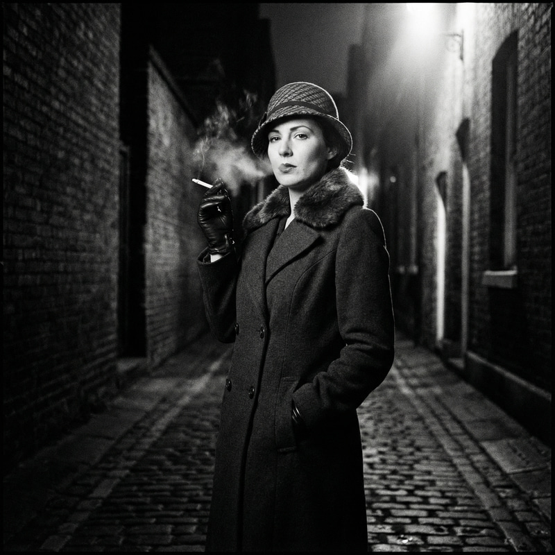 Elegant 1920s Fashion in a Shadowy Alley Elegant 1920s Fashion in a Shadowy Alley