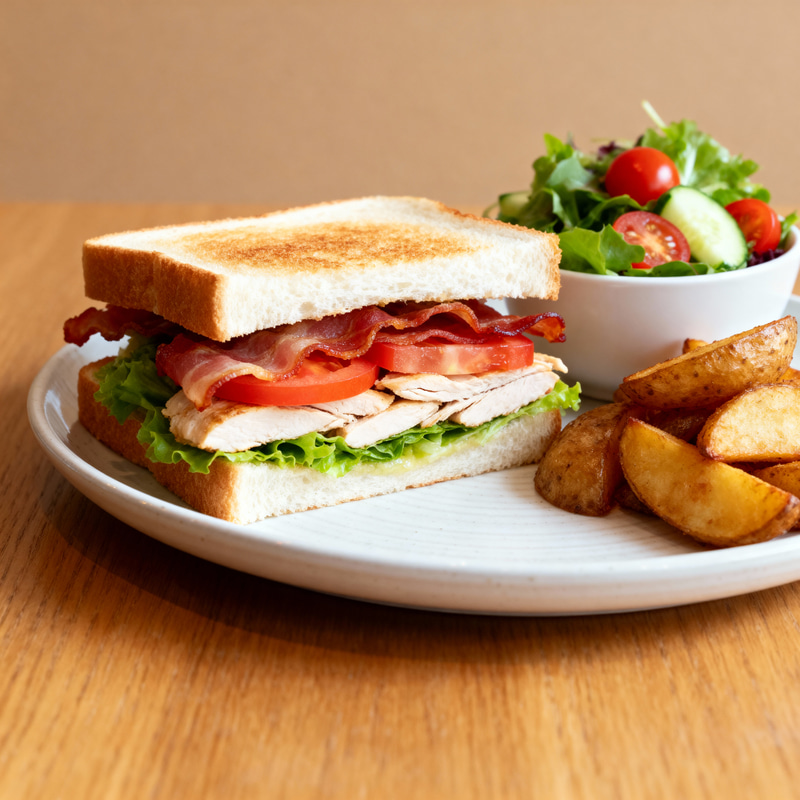 Delicious Club Sandwich with Salads and Fries Delicious Club Sandwich with Salads and Fries