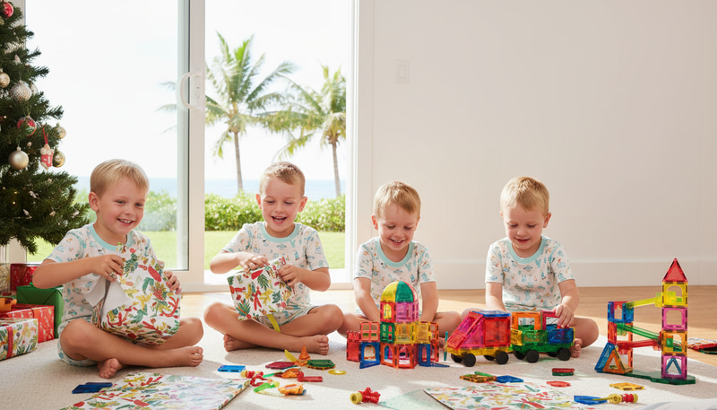 Joyful Christmas Morning with Kids Unwrapping Gifts