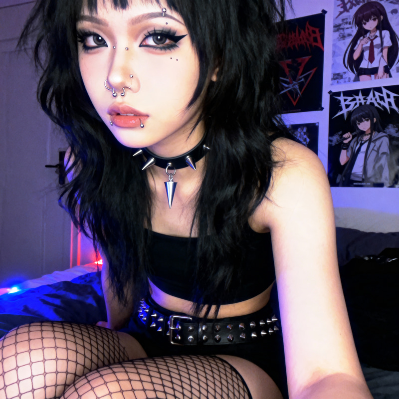 Stylish Emo Girl with Black Hair and Piercings Stylish Emo Girl with Black Hair and Piercings