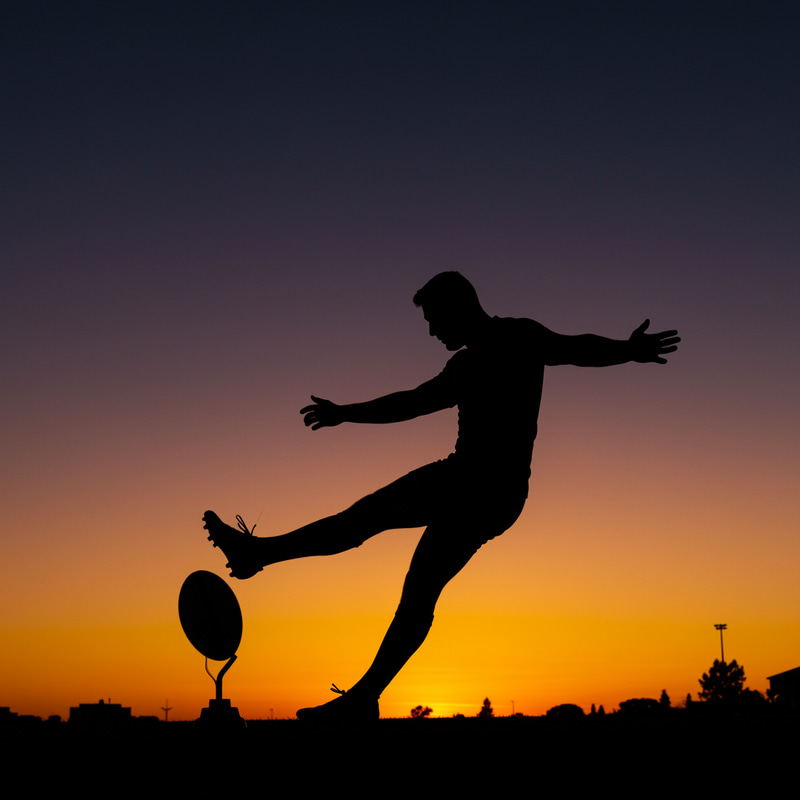 Rugby Player Kicking Ball - Silhouette Art Rugby Player Kicking Ball - Silhouette Art