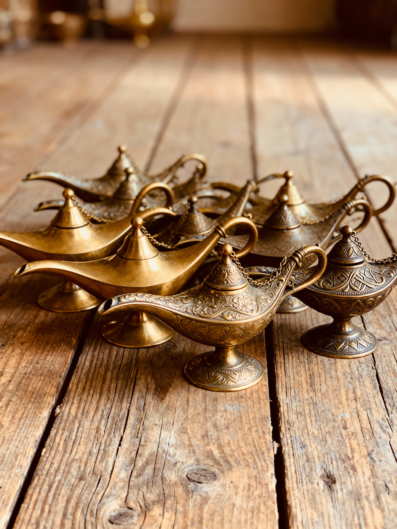 Mystical Genie's Lamps on Rustic Wood Floor Mystical Genie's Lamps on Rustic Wood Floor