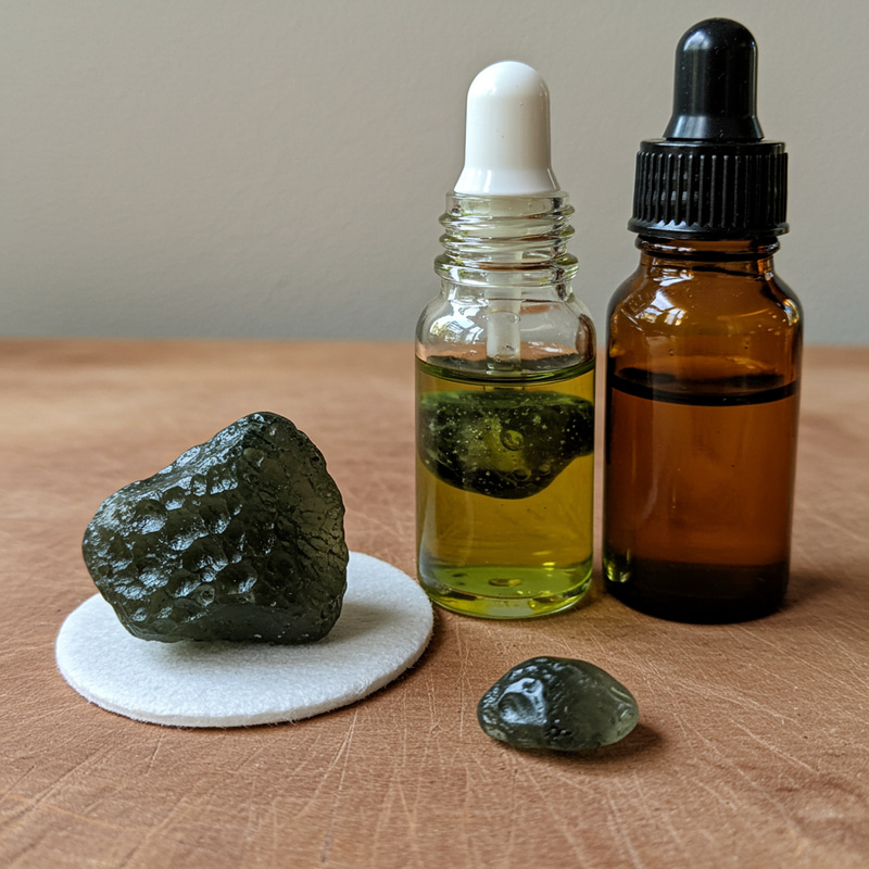 Essential Oils Infused with Moldavite Essential Oils Infused with Moldavite
