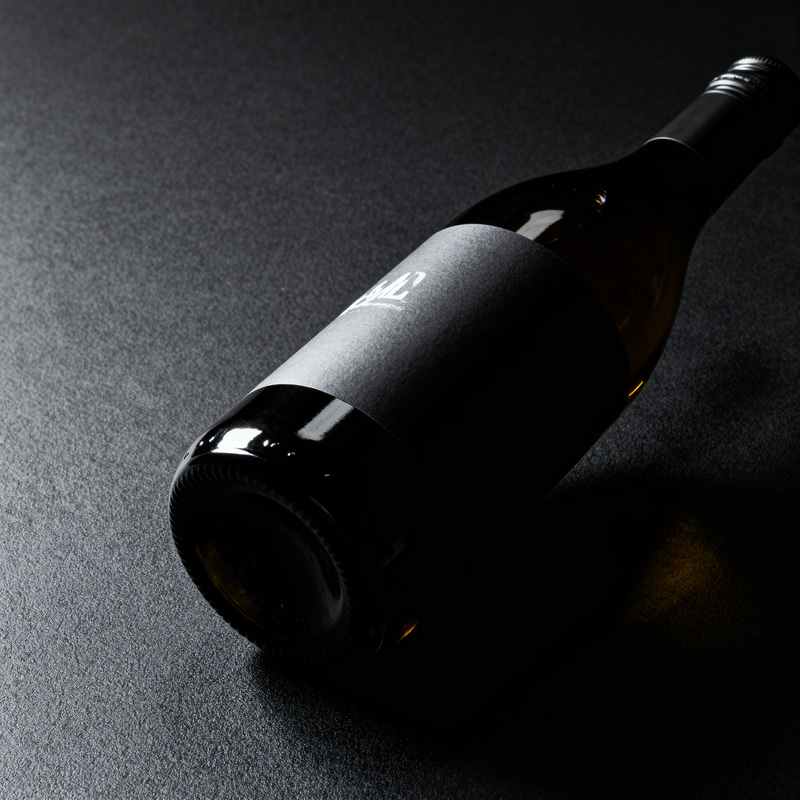 Stylish Dark Bottle Design with Hidden Label Stylish Dark Bottle Design with Hidden Label
