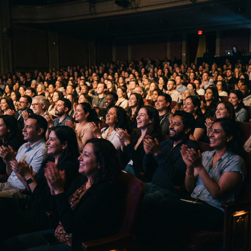 Diverse Audience Enjoying Theater Performance